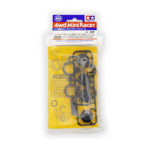Bustina Tamiya 15545 contenente 4 gomme Hard grigie da 26mm e cerchi Carbon Dish (Lenticolari) per Mini 4WD